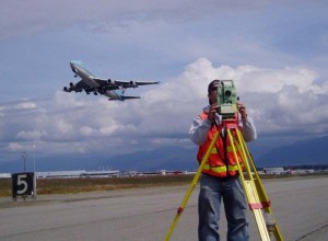 Surveying Ted Stevens Anchorage International Airport. Korean Air cargo jet flying over.