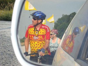 Natalie Smigel of Peru, IL caught a glimpse of some cyclists behind her in rural Indiana this past June. The group was participating in the HIS Home 300, a 300-mile ride from Illinois to Ohio, which raises funds to support an orphanage in Haiti.