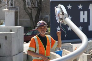 Bob Dion is a seasoned electrician who takes pride in the fact that the work he does will impact the community. This photo, taken at the Pawtucket River Bridge Replacement Project in Pawtucket, RI, reflects his positive commitment to the project and the State as a whole.