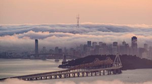 New East Span of the San Francisco Bay Bridge under construction during a foggy April afternoon in the Bay Area. New bridge will include a pedestrian and bike paths that will connect San Francisco and Alameda counties.