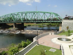 A new bridge and park constructed in Westfield, Ma. The bridge provides an historic feel with new materials.