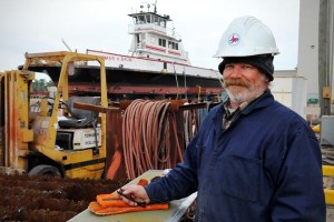 Tommy Blayden, a welder with the NCDOT Ferry Division, preps a section of a ferry’s hull plate. The plate will later be welded into place, thus, maintaining the sea worthiness of vessel and extending its future safe use.