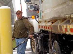Chad Dial of Holmes County in Ohio is refueling an Ohio Department of Transportation snowplow during a winter event in February 2013. He is one of the many at ODOT who work around the clock in cold weather to keep Ohio highways safe during the snow and ice season.