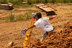 A surveyor at an Oklahoma Department of Transportation construction site on US-70.