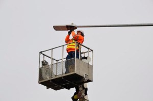 WSDOT's Tom Knowlton installed the first LED lights in Washington state. Just days later, Olympia drivers saw the road in a whole new light. WSDOT expects the 88-light LED system to last 15 years, reduce energy usage by 1.7 million kilowatt hours of electricity and save $75,000.